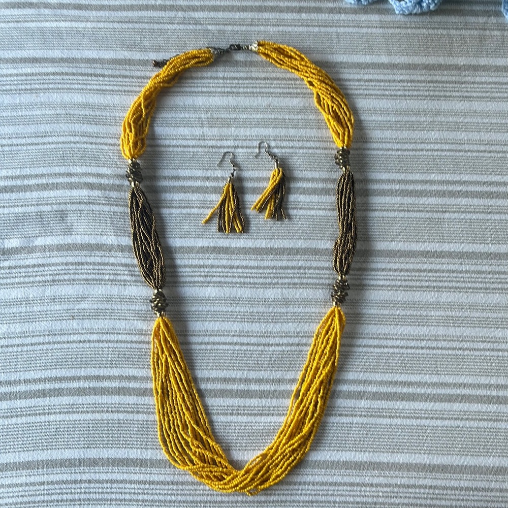 Yellow and gold beaded necklace with matching earrings